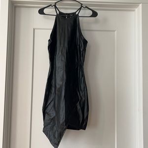 Asymmetrical leather dress.